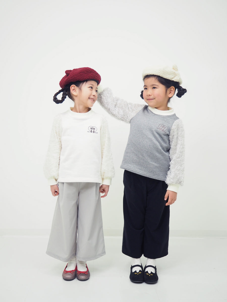 Pullover with shaggy sleeves
