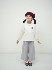 Pullover with shaggy sleeves