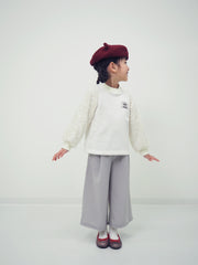 Pullover with shaggy sleeves